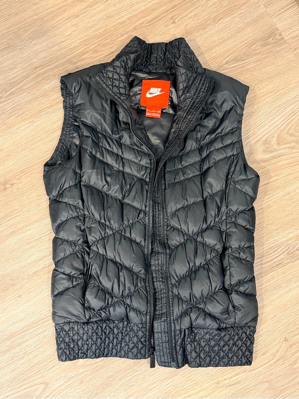 Nike Black Quilted Sleeveless Puffer Vest with High Collar